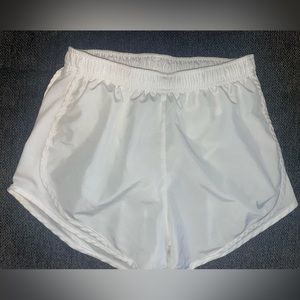 White Nike running shorts. Size small. Worn a few times.